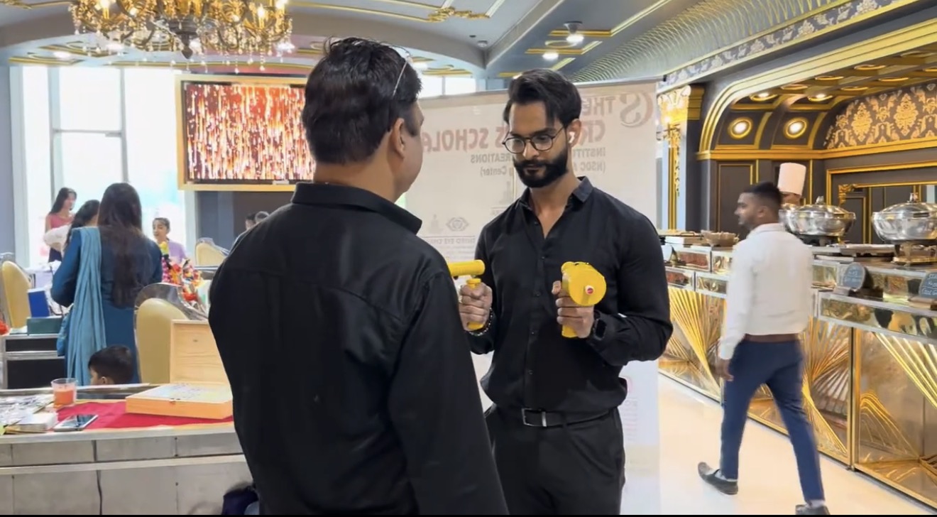 Ansh Verma demonstrating aura scanning devices